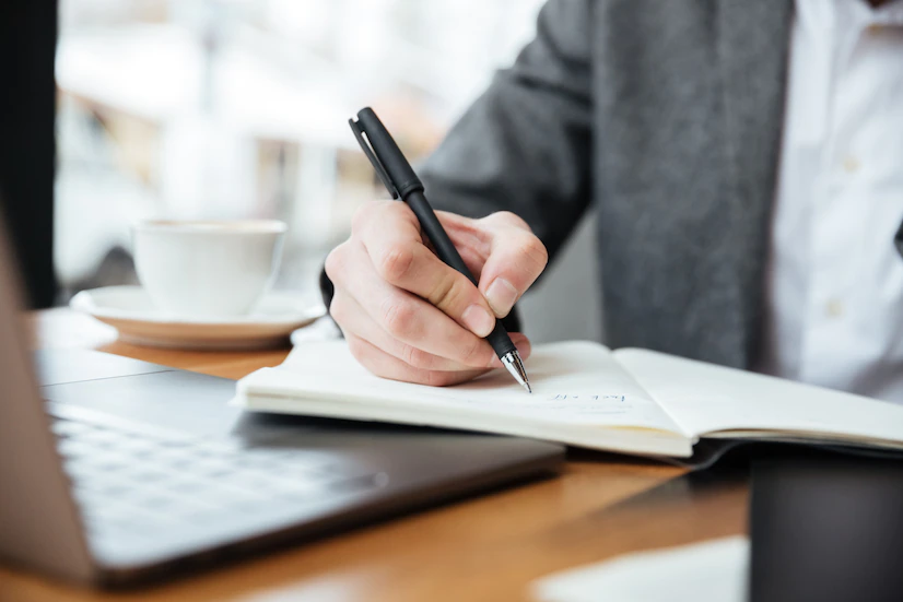 businessman-writing-something